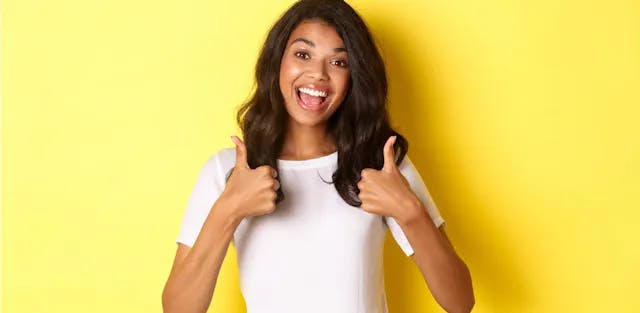 Woman giving a thumbs up