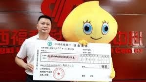 Person in costume receiving lottery prize