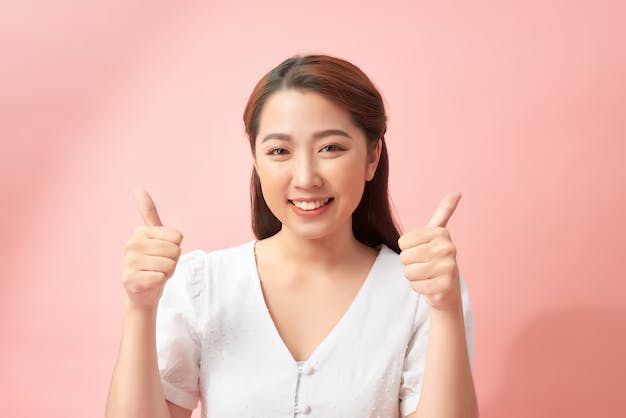 Woman giving a thumbs up