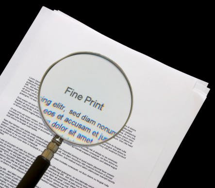 Magnifying glass enlarging small print