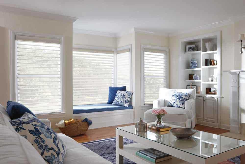 Window treatments for bay window with seat