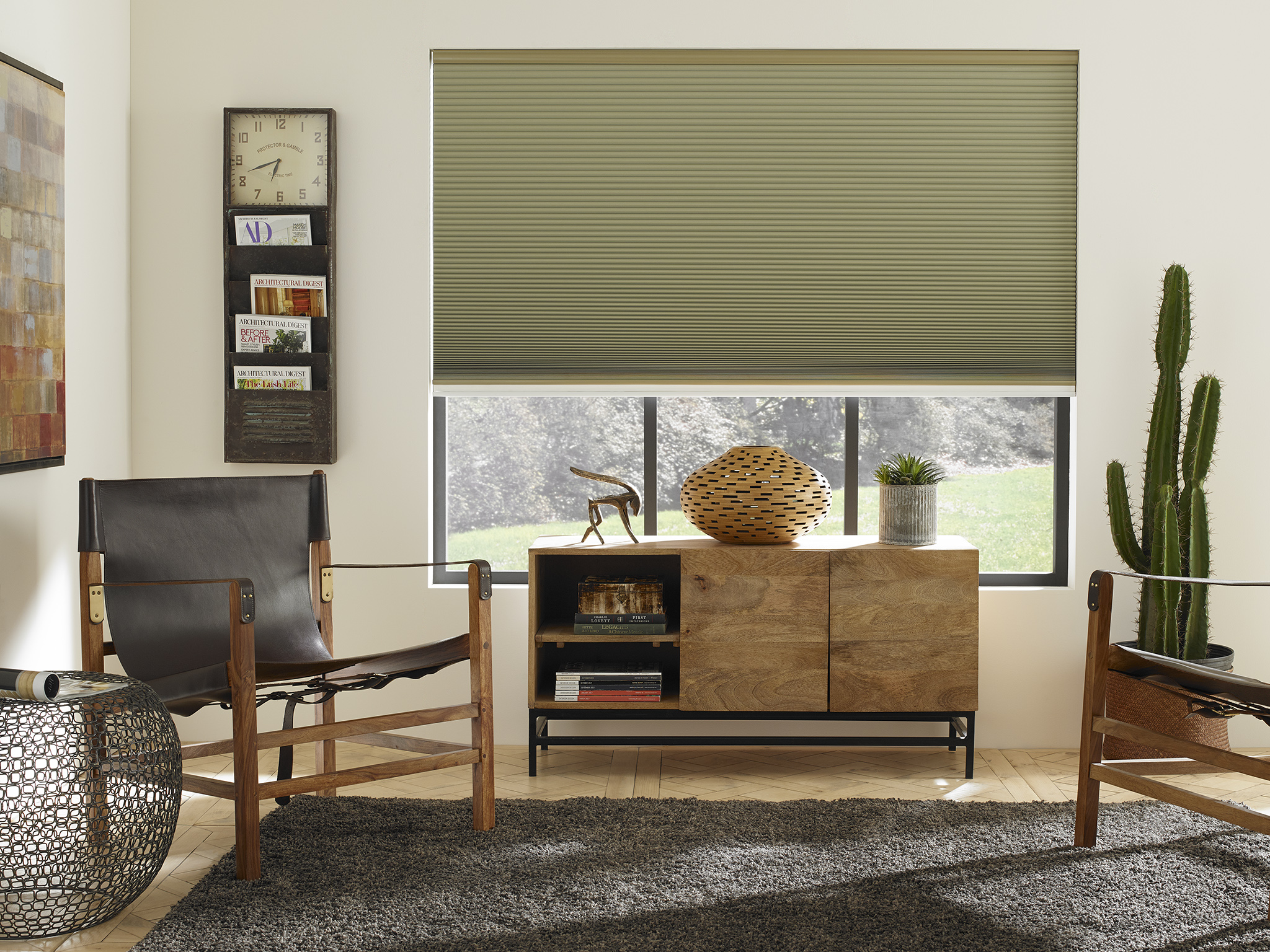 A modern living room with Blinds.com Premium Blackout Cellular Shades
