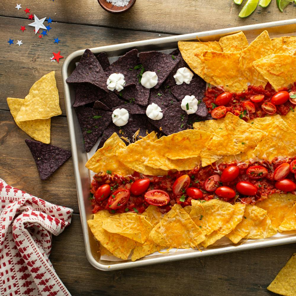 fourth of july party idea, tray of red white and blue chips and salsa