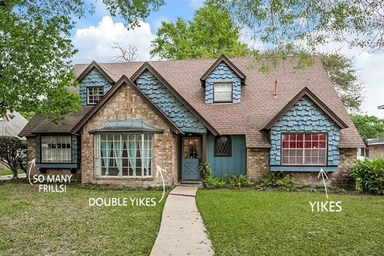 home front elevation with old fashioned drapes and mismatched window covering colors