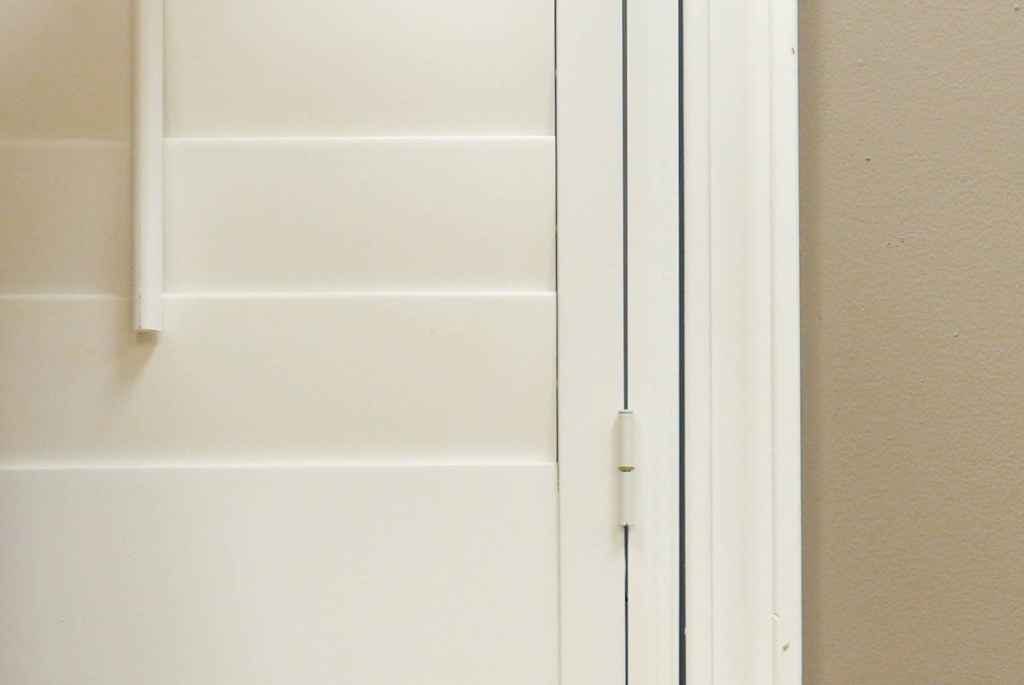 closeup of white interior shutters