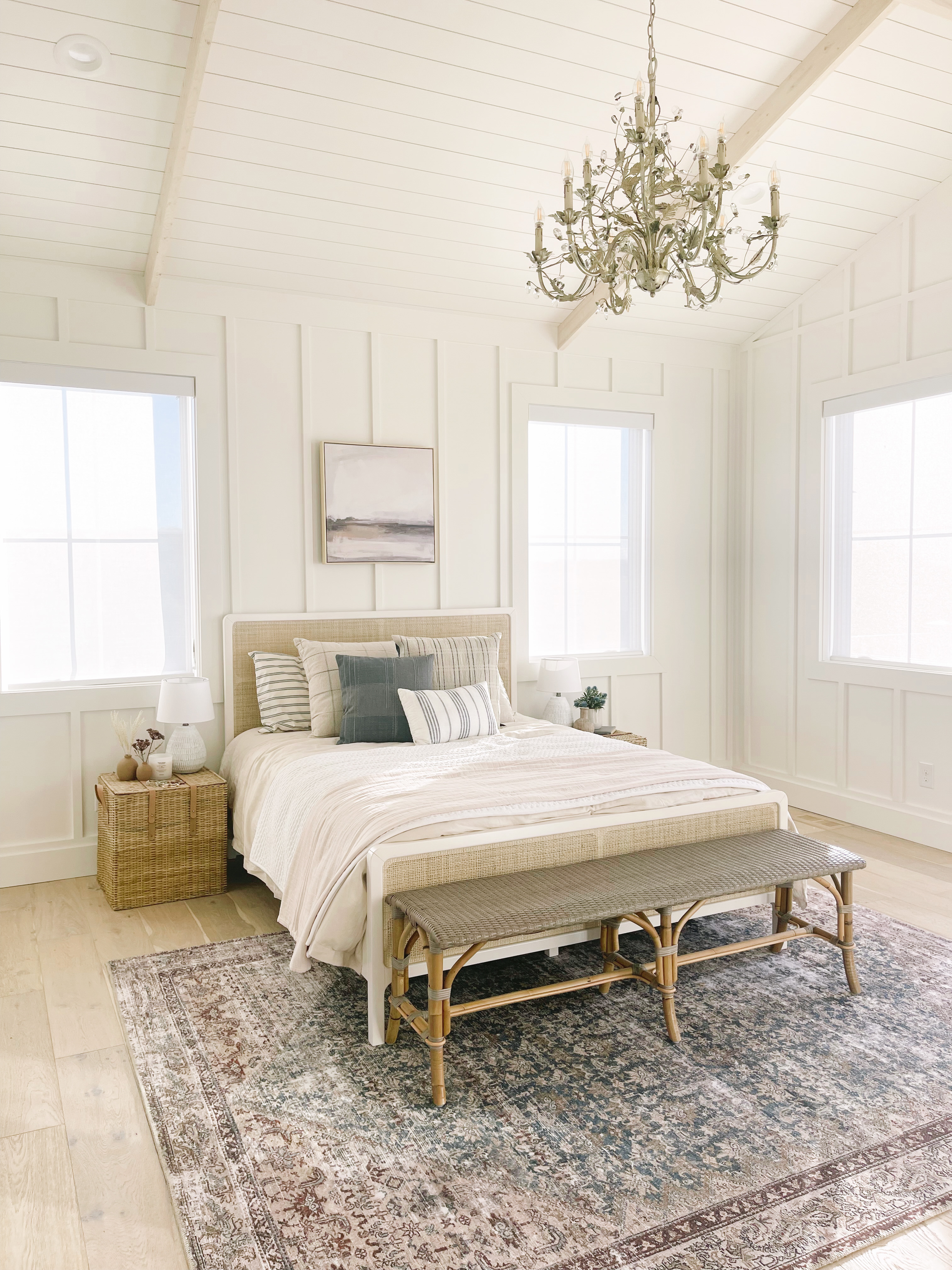 Nina's coastal farmhouse bedroom. Solar shades are covering the windows.
