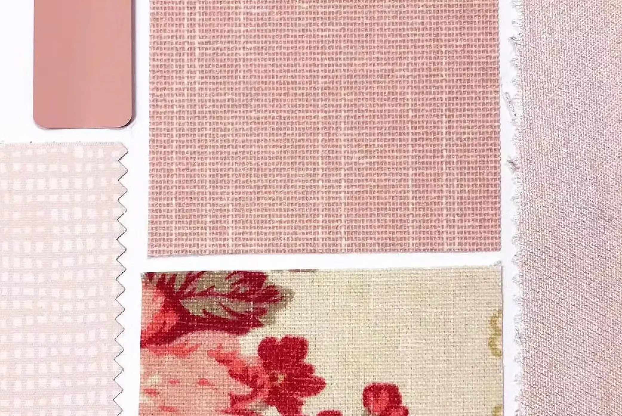 An assortment of pink, red and floral color samples.