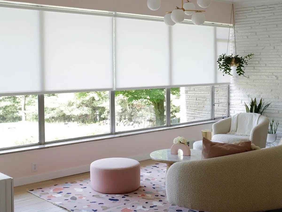 Modern living room with light filtering shades.