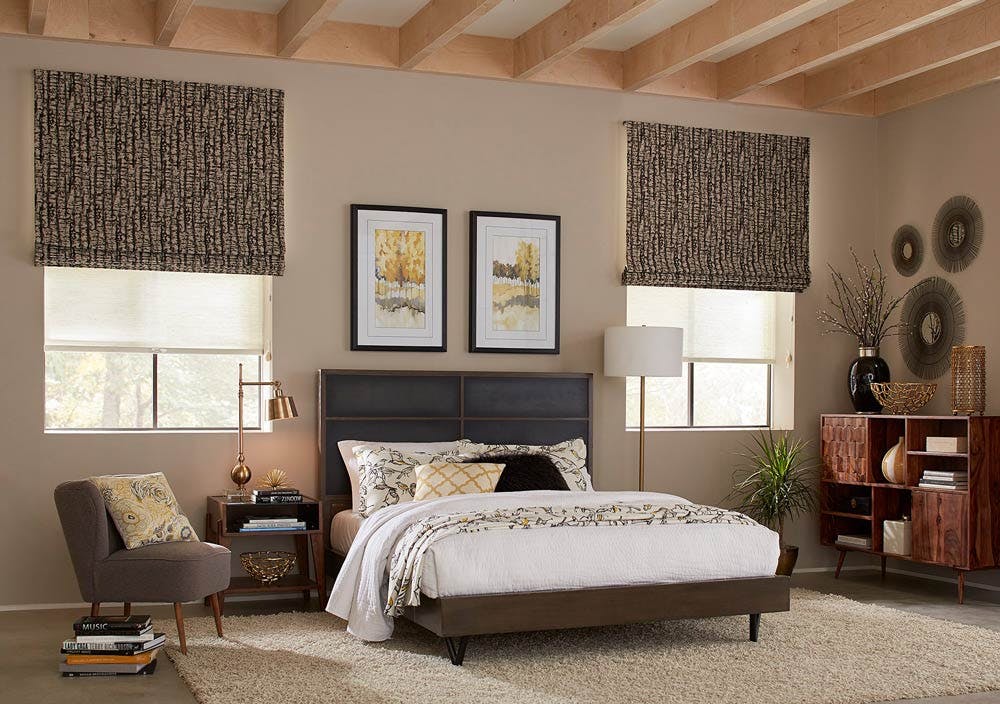 bedroom with brown roman shades