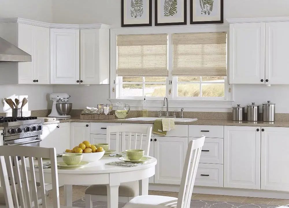 Blinds.com woven wood shades in a kitchen above the sink