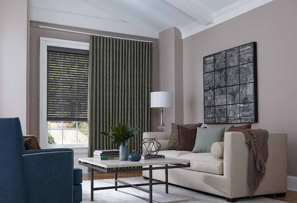 wall of windows covered with curtains