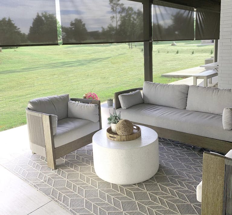 DIY outdoor patio with outdoor seating and Blinds.com outdoor shades