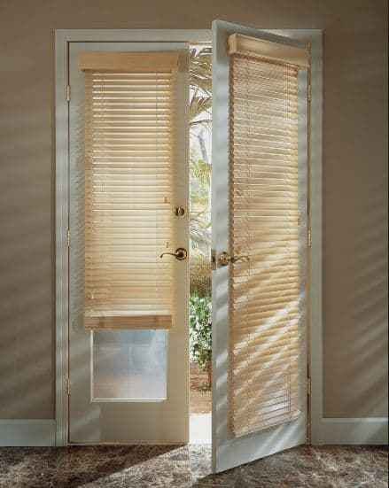 Blinds on a set of open doors