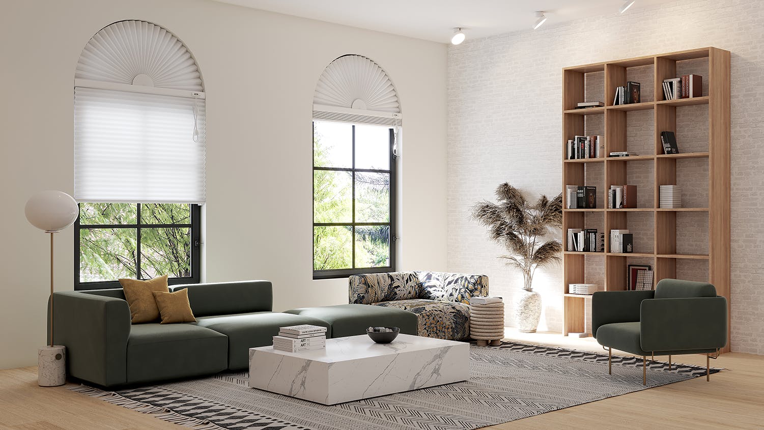 living room with sofa bookshelves white arched window treatments