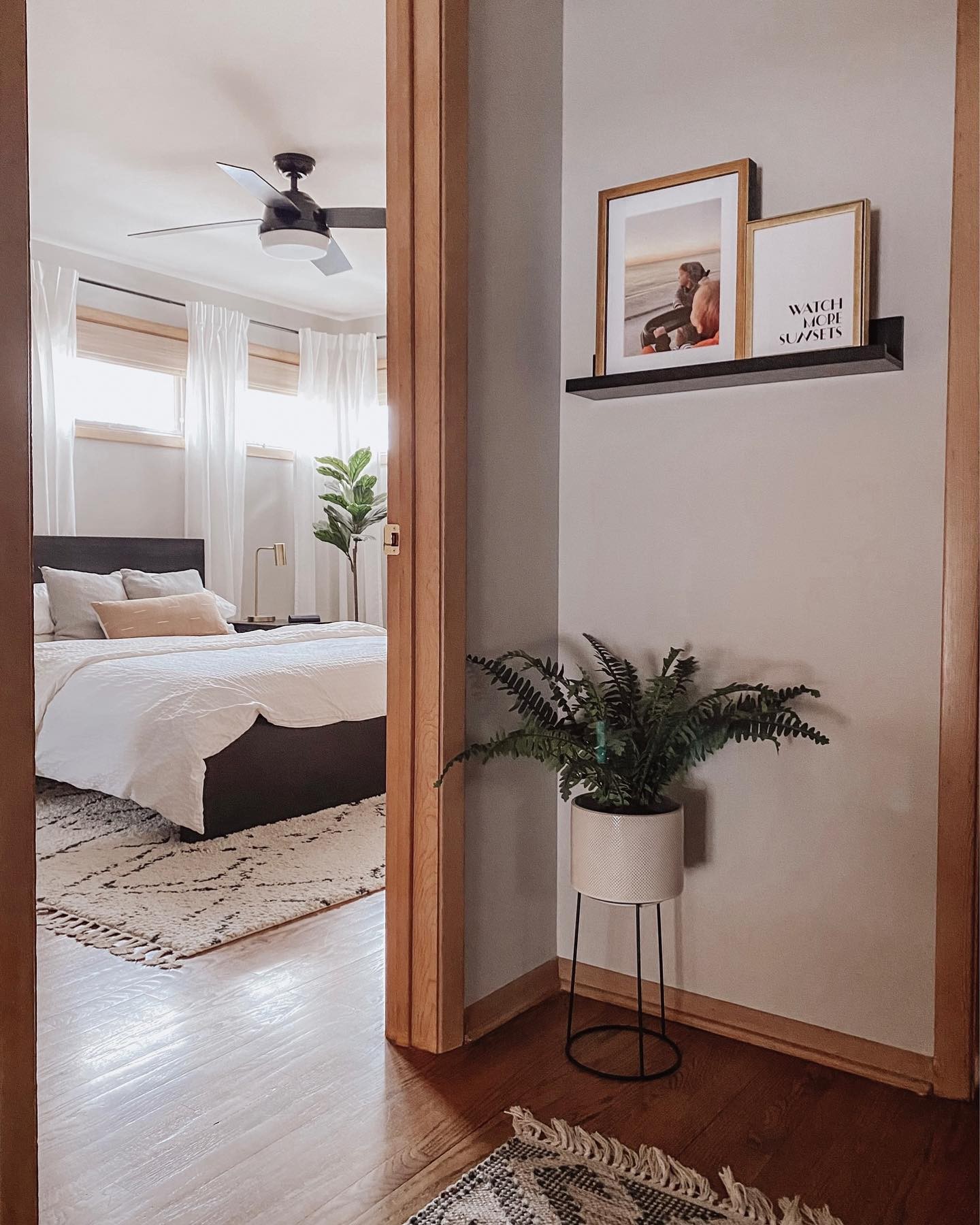 a photo of the bedroom taken from the hallway