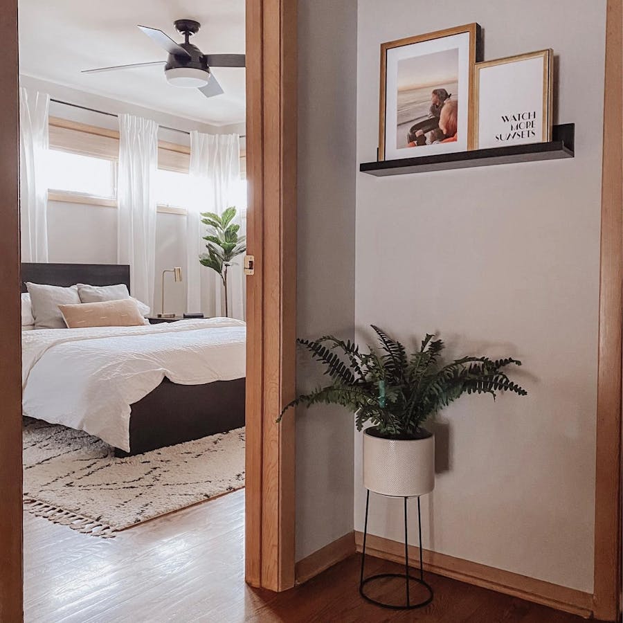 a photo of the bedroom taken from the hallway