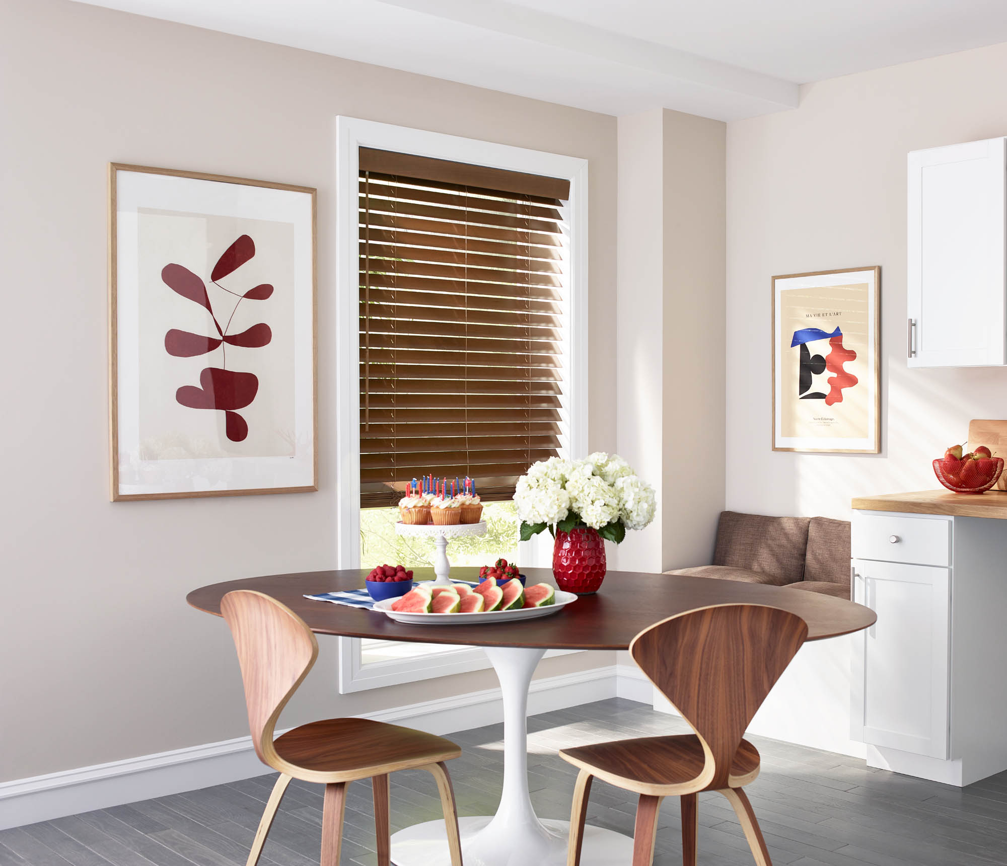 A kitchen nook with red white and blue Fourth of July party decor 