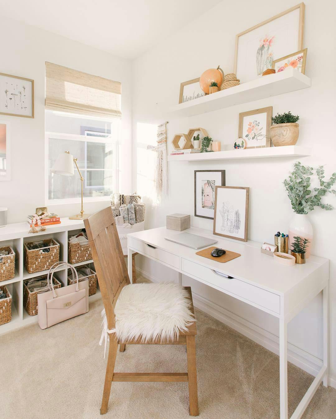 home office with white desk and storage cubbies