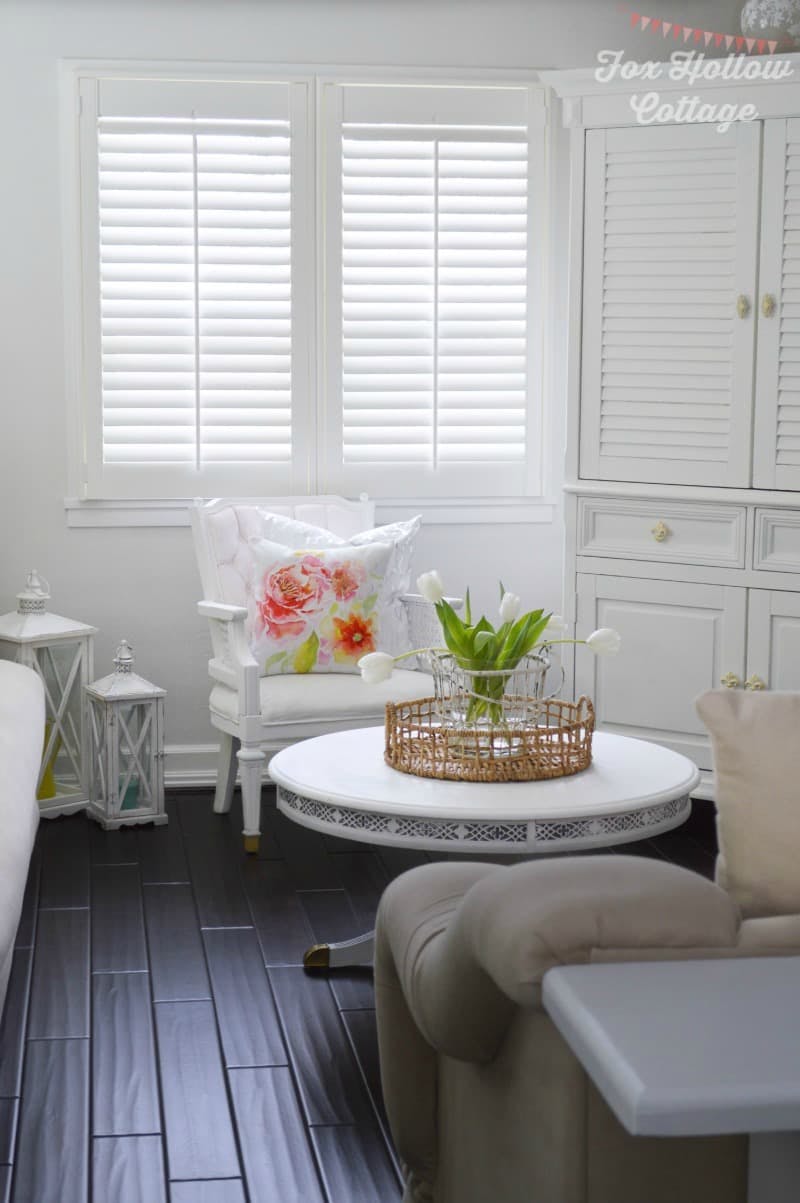 White interior shutters in a living room