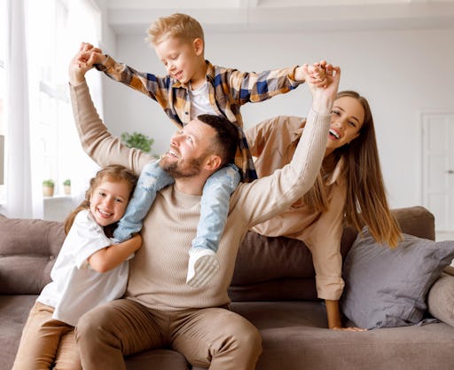 Family of four enjoying a clean home