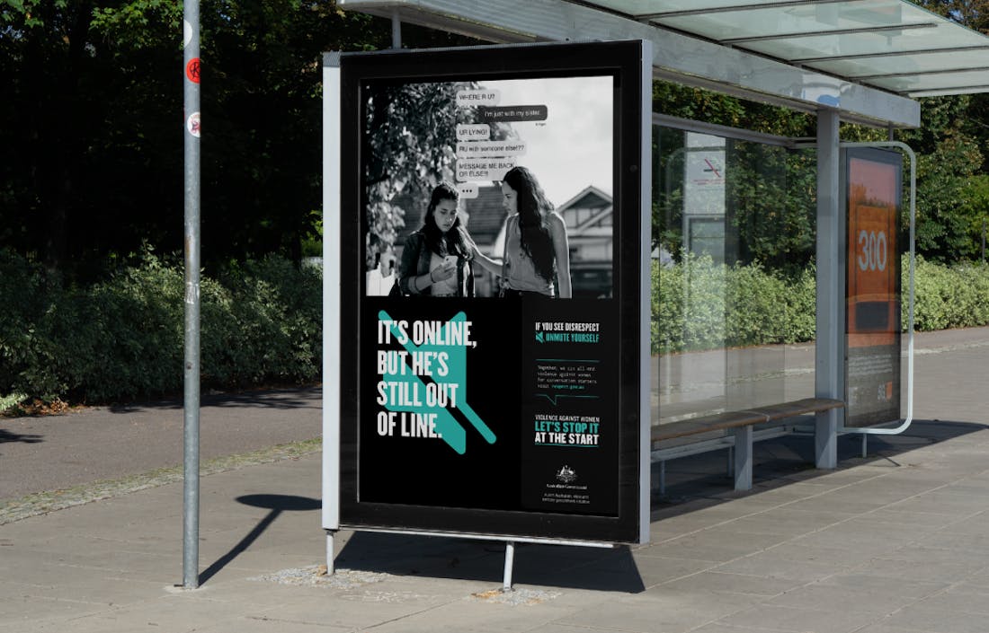 An image of a billboard on a bus stop. The text reads "It's online. But he's still out of line". 