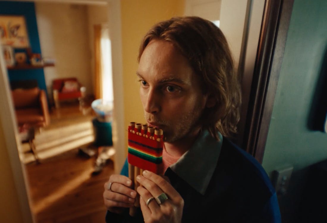 A man playing the pan flute.