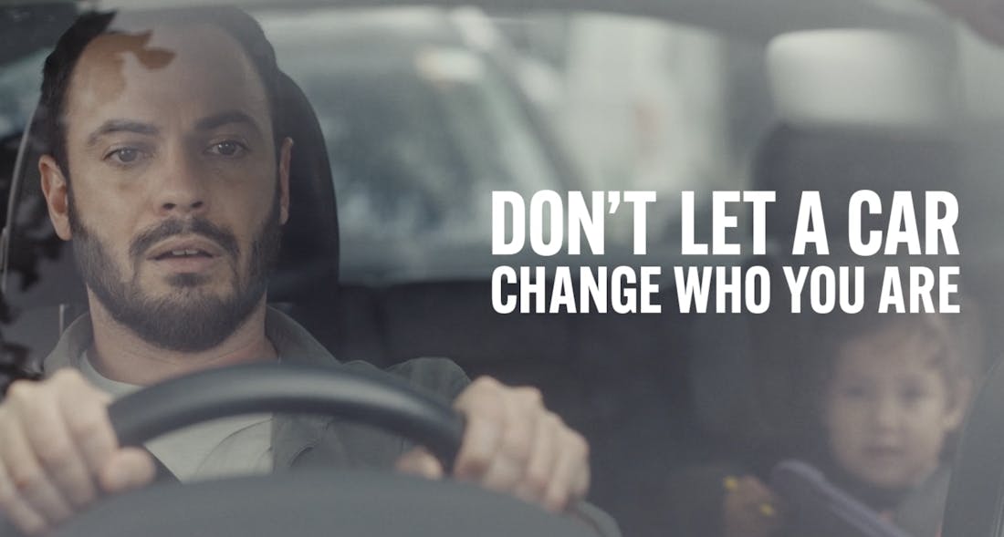 Thumbnail of a father sitting in a car