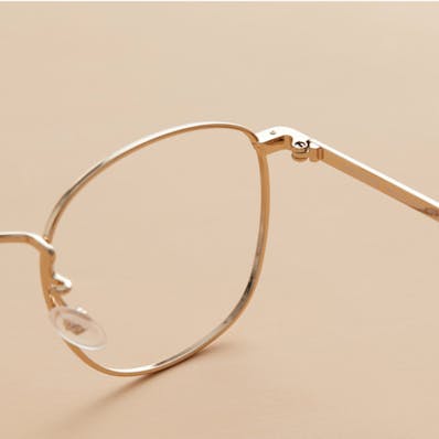 hinge of a metal glasses frame
