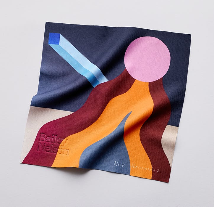 An abstract geometric lens cloth designed by Nick Hernandez.