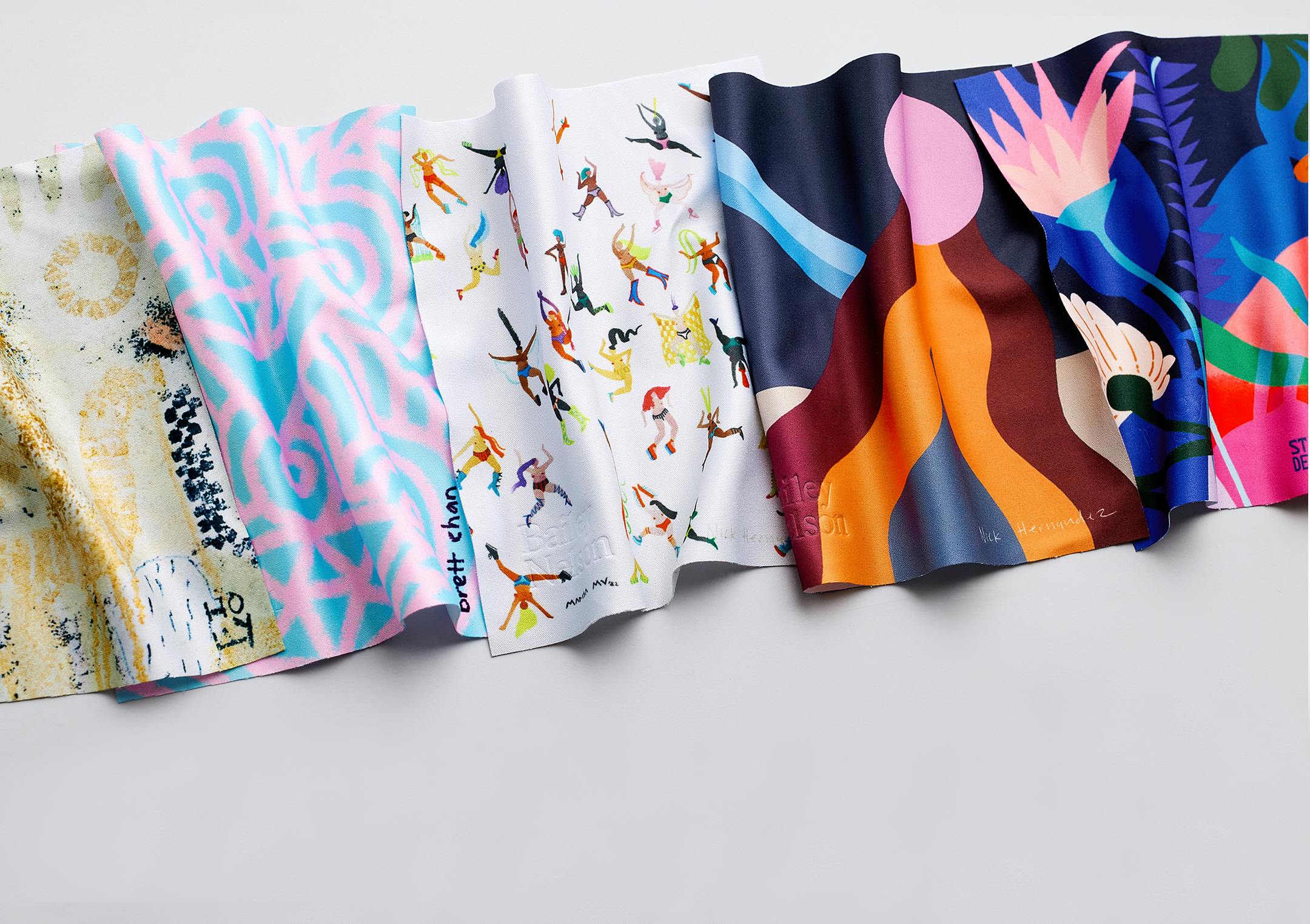 An image of 5 different custom designed lens cloths for Bailey Nelson by Australian artists