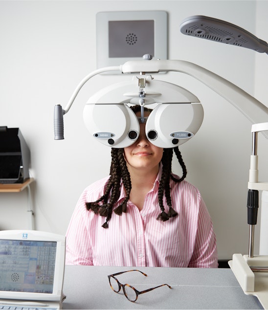 Woman getting eyes tested 