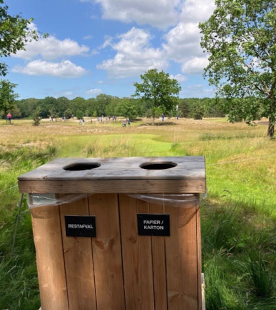 Afval scheiden op een golfterrein tijdens het KLM open