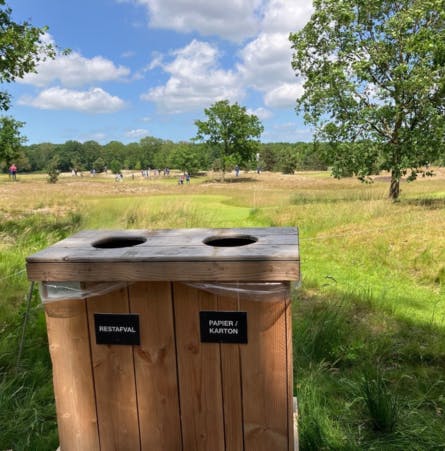 Afval scheiden op een golfterrein tijdens het KLM open