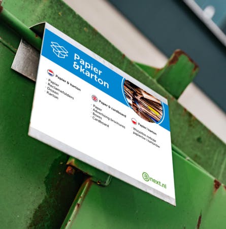 communicatie over afvalscheiding op een container