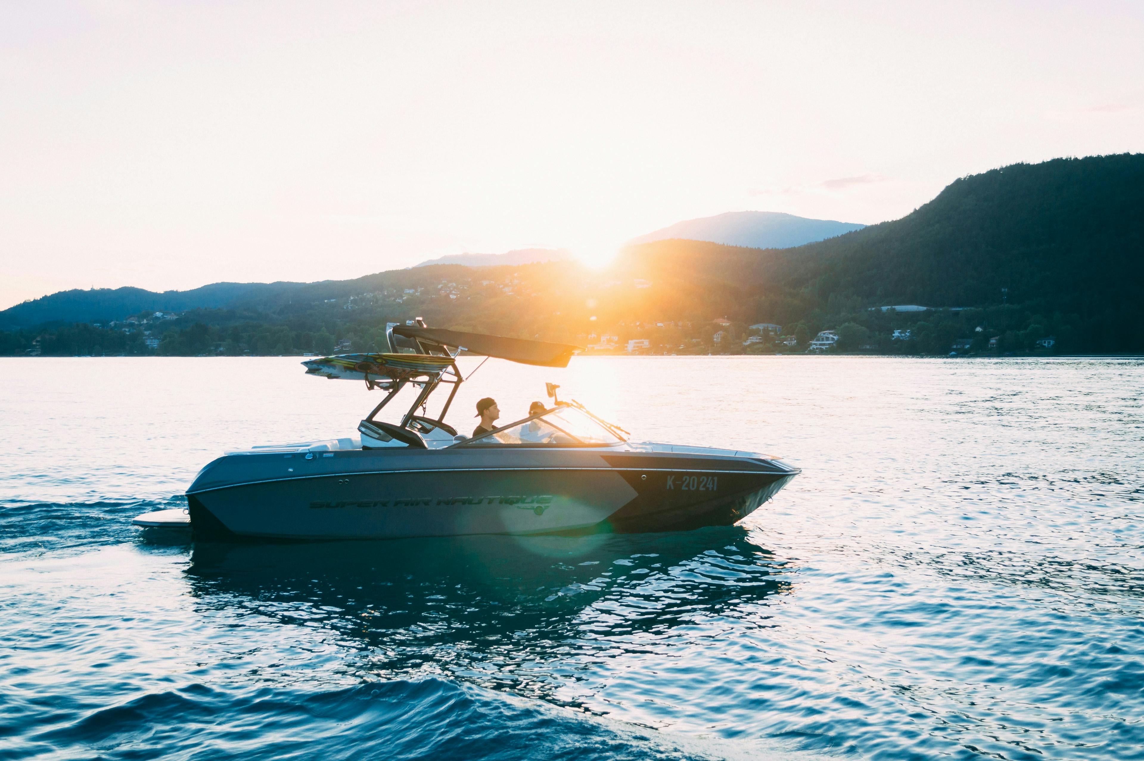 yachting on the lake during sunset, Navigating Your Boat Purchase: A Step-by-Step Guide