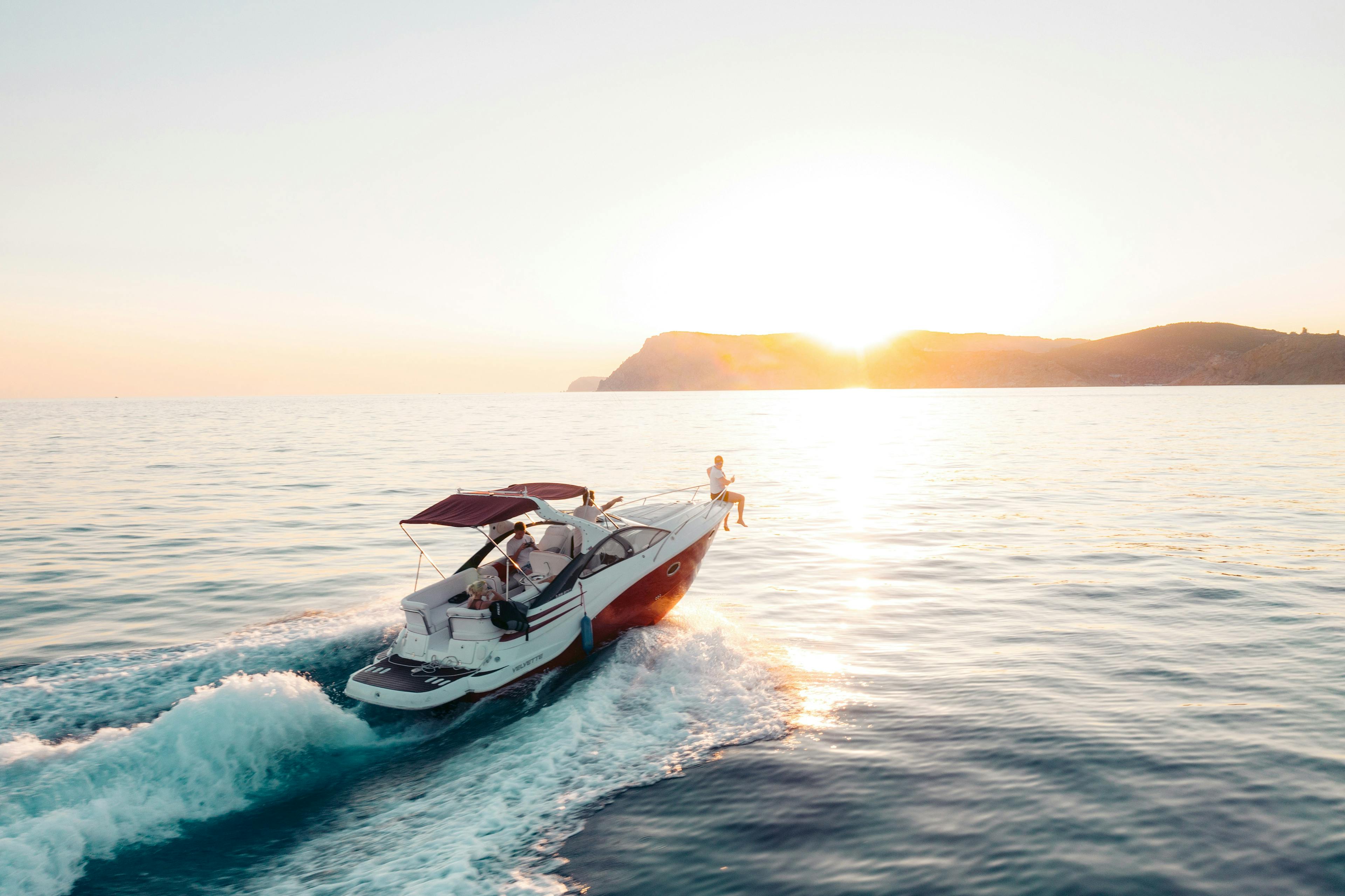 beatiful boat during the sunset in the Oceane, The Insider's Guide to Buying a Boat: What You Need to Know About Costs