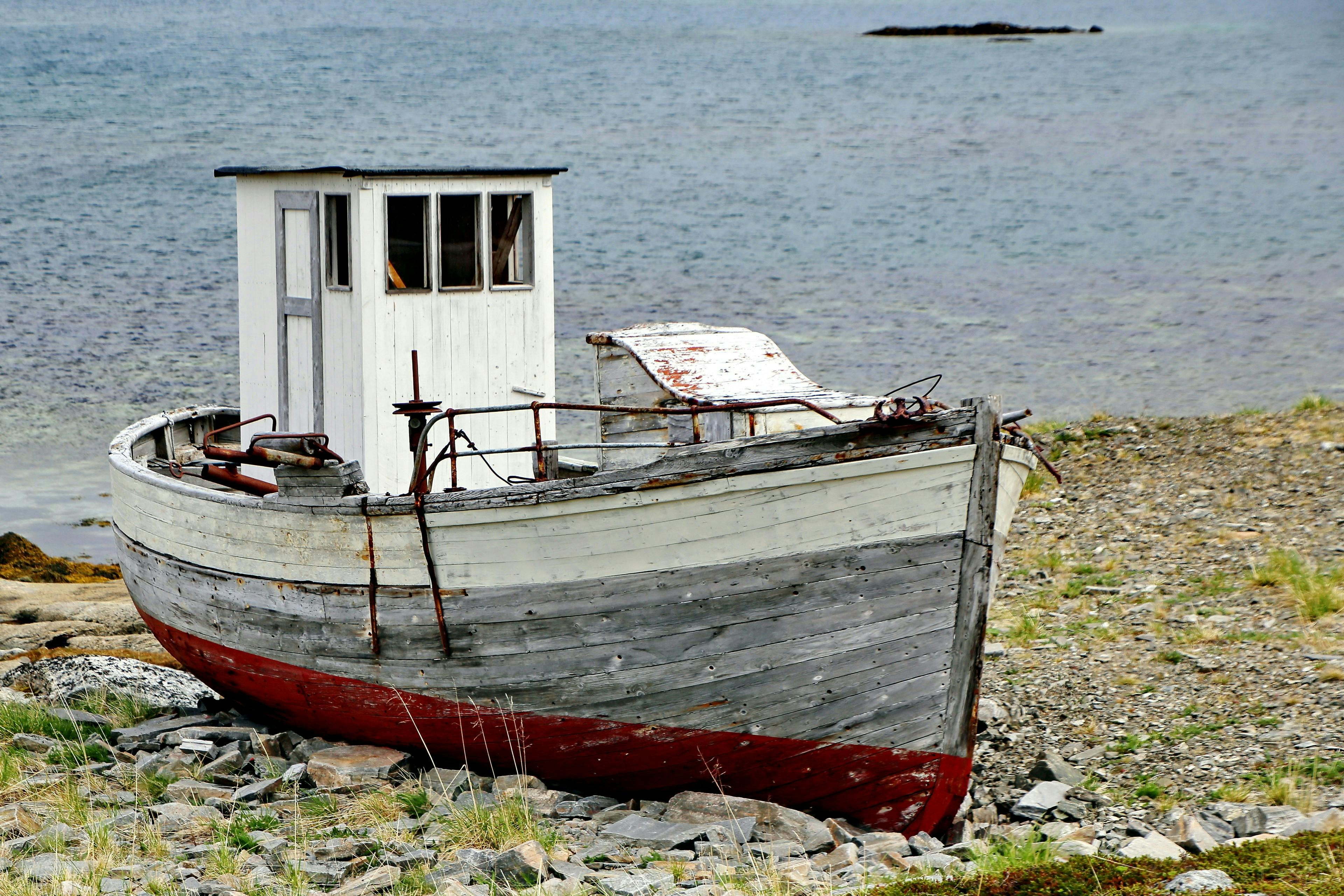 used old boat on the shore Exploring the Cost of Used Boats: A Buyer's Guide