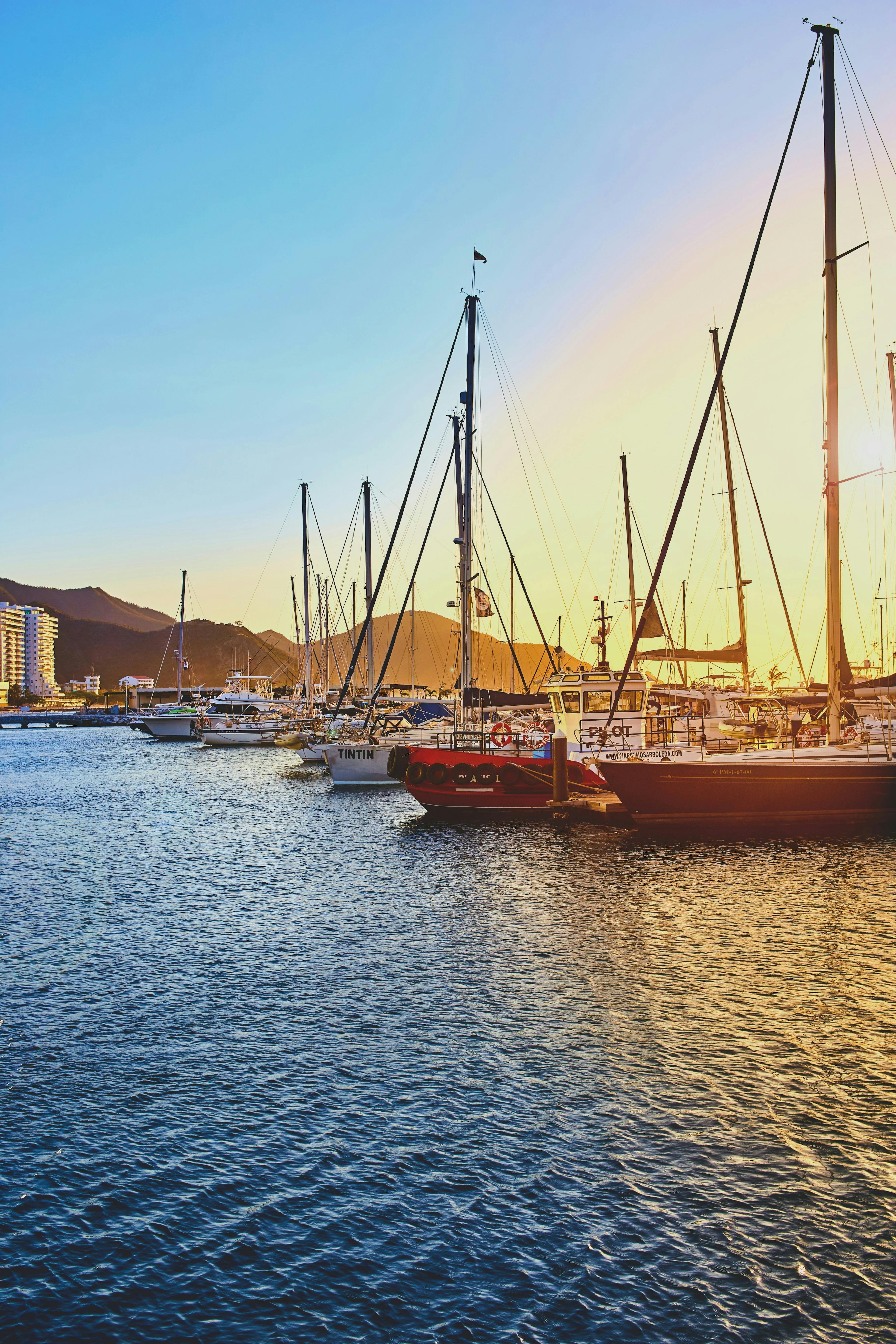 sailboats in the marina during the sunset The True Cost of Boat Ownership: What You Need to Know