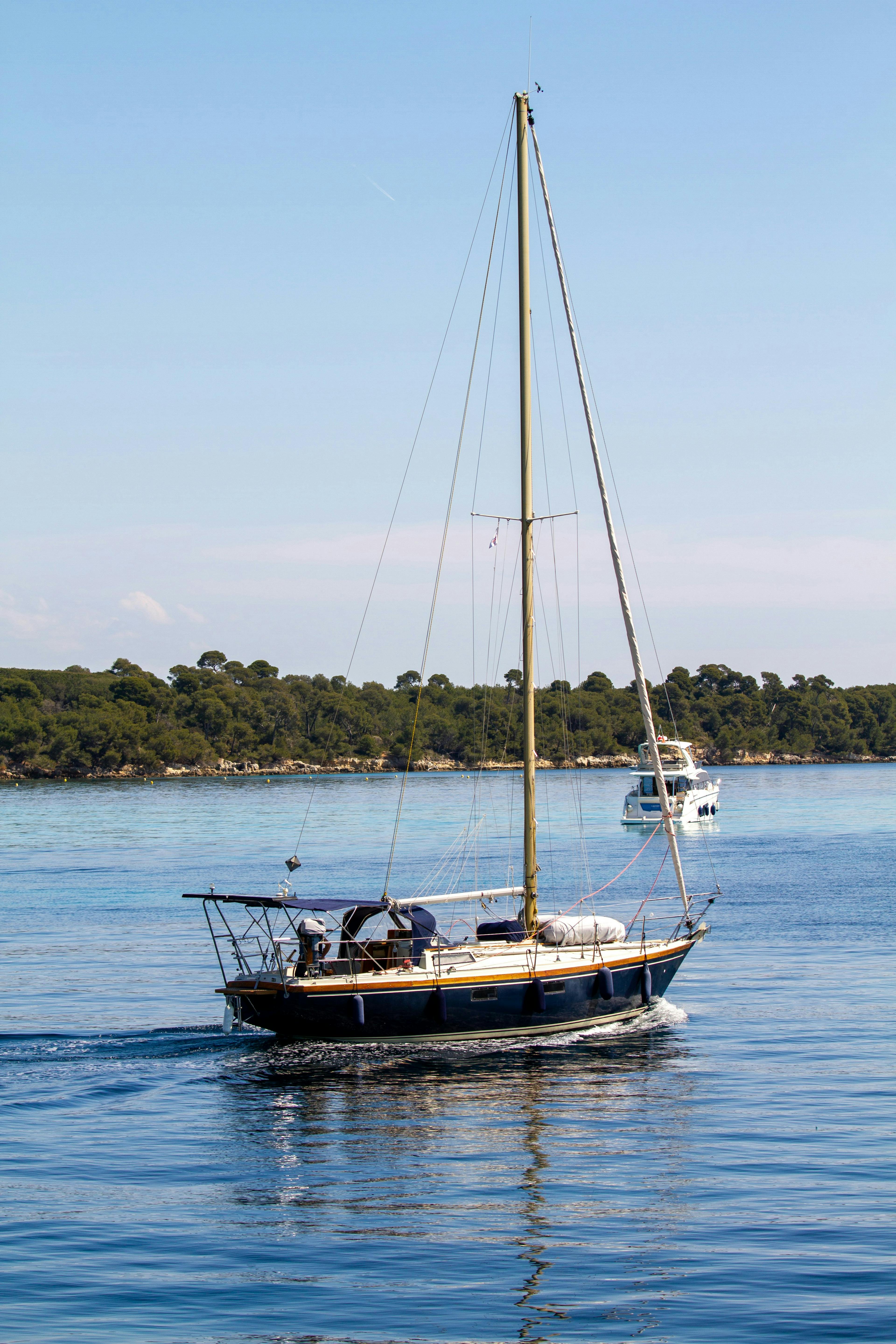 Sail boat on the lake bay