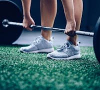 lifting a heavy barbell.