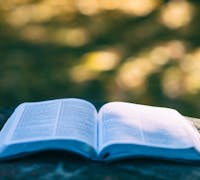an open Bible on a table