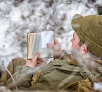 reading the bible in the field