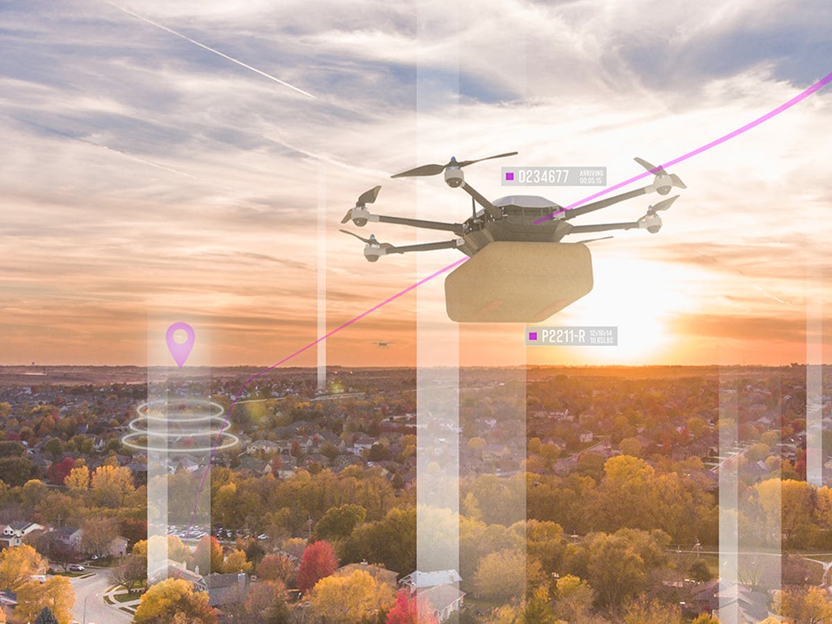 Skygrid concept of cargo drone traveling over suburban landscape