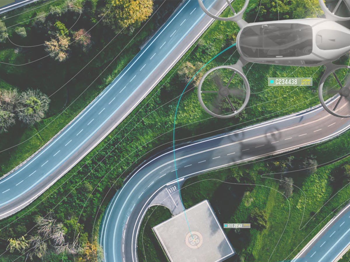 Skygrid concept of passenger drone taking a short path as it passes over winding roads