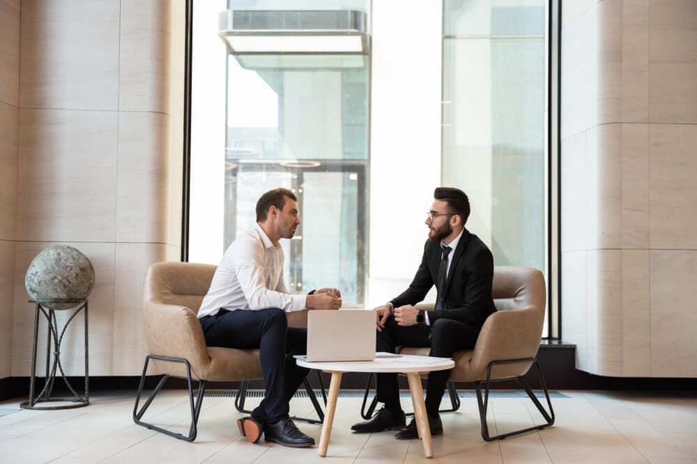 businessmen in the middle of a coaching session