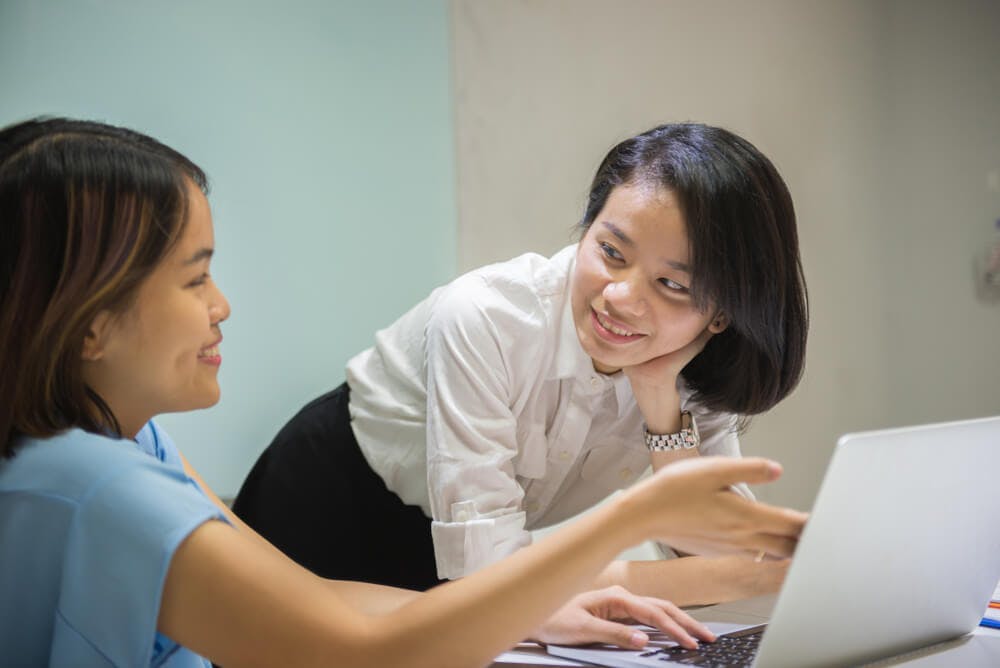 two female professionals in the middle of career counselling