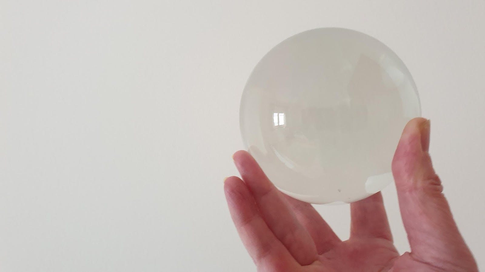 glass ball held in a hand