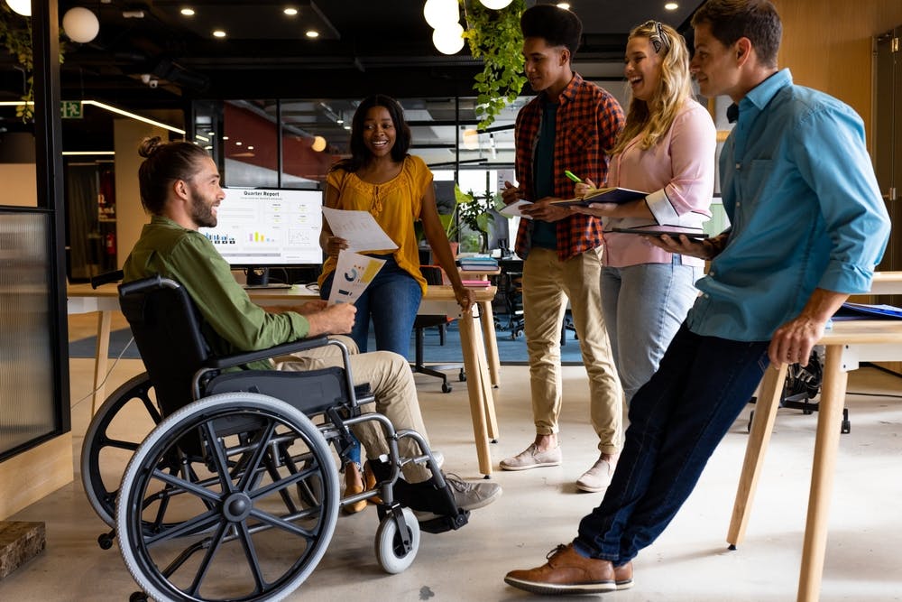 A diverse staff working together on the same goals