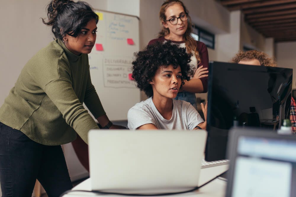 Group of women in their early careers learning from each other