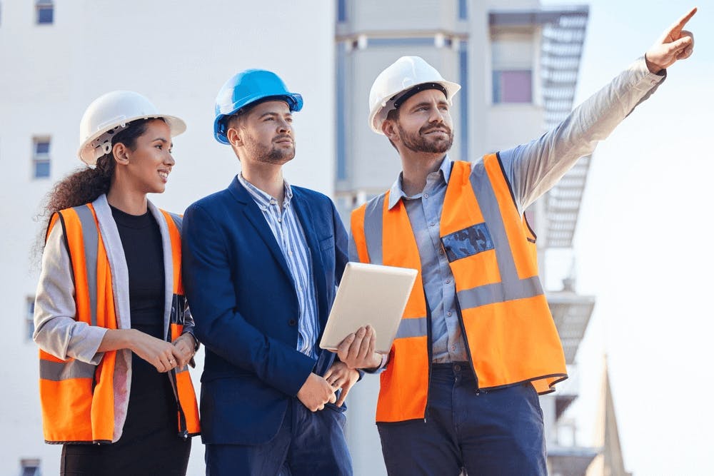 A group of workers for a utility company discussing sustainability efforts